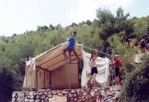 Volunteers building a tend